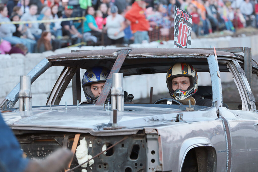 Jordan Wood lines up his car before a demolition derby